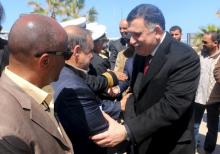 Libyan Prime Minister-designate Fayez Seraj (R) is greeted upon arrival in Tripoli, Libya, March 30, 2016. PHOTO BY REUTERS/Hani Amara