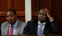 Kenyan politicians Ferdinand Waititu and Moses Kuria sit in the dock at the Milimani Law Courts over alleged "hate speech", flagging growing tension in Kenya's capital Nairobi, June 14, 2016. PHOTO BY REUTERS/Thomas Mukoya