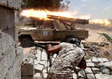 Libyan forces allied with the U.N.-backed government fire weapons during a battle with IS fighters in Sirte, Libya, July 21, 2016. PHOTO BY REUTERS/Goran Tomasevic