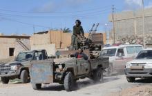 Members of East Libyan forces ride a vehicle after taking control of Ganfouda district in Benghazi, Libya, January 26, 2017. PHOTO BY REUTERS/Esam Omran Al-Fetori