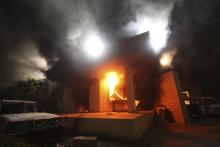 The U.S. Consulate in Benghazi is seen in flames during a protest by an armed group said to have been protesting a film being produced in the United States, September 11, 2012. PHOTO BY REUTERS/Esam Al-Fetori