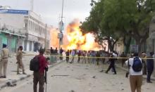 A still from a Reuters TV video shows a secondary explosion after a suspected suicide car bomb rammed into the gates of a hotel in Mogadishu, Somalia, January 25, 2017. PHOTO BY REUTERS