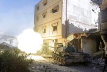 A military vehicle belonging to the Libyan National Army fires towards the positions of Islamist militants during clashes in Khreibish district in Benghazi, Libya, November 9, 2017. PHOTO BY REUTERS/Esam Omran Al-Fetori