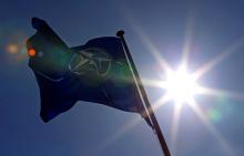 A NATO flag flies at the Alliance's headquarters in Brussels, March 2, 2014. PHOTO BY REUTERS/Yves Herman