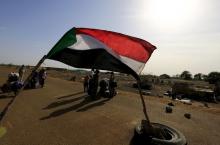 Sudanese military personnel check belongings of South Sudanese fleeing an attack on the South Sudanese town of Rank, at a border gate in Joda, along the Sudanese border, in this April 18, 2014 file photo. PHOTO BY REUTERS/Mohamed Nureldin Abdallah