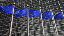 European Union flags fly in front of the European Commission headquarters in Brussels