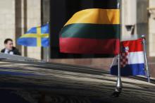 Ambassadors' cars with Lithuanian, Croatian and Swedish flags are parked near the Russian Foreign Ministry in Moscow, Russia, March 30, 2018. PHOTO BY REUTERS/Maxim Shemetov