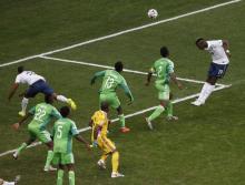 France's Paul Pogba (19) heads to score a goal against Nigeria during their 2014 World Cup round of 16 game at the Brasilia national stadium in Brasilia, June 30, 2014. PHOTO BY REUTERS/David Gray