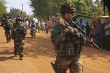 French soldiers carry their weapons on patrol in Boy-Rabe, a northern district of Bangui