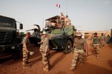 French soldiers prepare their armoured vehicles at the Relay Desert Platform Camp (PfDR) in Ansongo, Mali, October 15, 2017, during the regional anti-insurgent Operation Barkhane. PHOTO BY REUTERS/Benoit Tessier