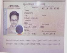 Fugitive former U.S. spy agency contractor Edward Snowden's new refugee documents granted by Russia