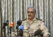 General Khalifa Haftar speaks during a news conference at a sports club in Abyar, a small town to the east of Benghazi