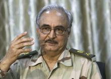 General Khalifa Haftar speaks during a news conference at a sports club in Abyar, a small town to the east of Benghazi