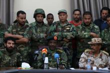 Libyan Army Special Forces Commander Wanis Bukhamada (front C) delivers a statement in Benghazi May 19, 2014. REUTERS/Esam Omran Al-Fetori