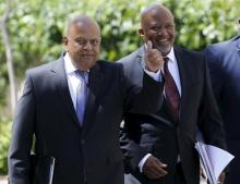 South Africa's Deputy Finance Minister Mcebisi Jonas (R) arrives with Finance Minister Pravin Gordhan for Gordhan's 2016 Budget address in Cape Town, February 24, 2016. PHOTO BY REUTERS/Mike Hutchings