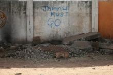 A writing on a wall reads "Jammeh Must Go", referring to Yahya Jammeh, along a street in Banjul, Gambia, January 21, 2017. PHOTO BY REUTERS/Afolabi sotunde