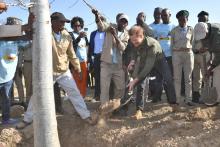 Britain's Prince Harry, Duke of Sussex, helps to plant a tree at the Chobe National Park, on day four of the royal tour of Africa, in Botswana, South Africa, September 26, 2019. PHOTO BY REUTERS/Dominic Lipinski