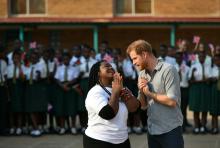 Britain's Prince Harry, Duke of Sussex, speasks to Angeline Murimirwa, the Executive Director for CAMFED in Africa, during his visit to Nalikule College of Education in Lilongwe, Malawi, September 29, 2019. PHOTO BY REUTERS/Dominic Lipinski/Pool 