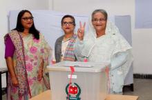 Prime Minister Sheikh Hasina gestures after casting her vote in the morning during the general election in Dhaka, Bangladesh, December 30, 2018. PHOTO BY REUTERS/Bangladesh Sangbad Sangstha