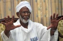 Leading Sudanese politician Hassan al-Turabi gestures during an interview in Khartoum, October 3, 2012. PHOTO BY REUTERS/Stringer