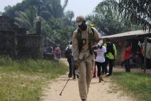 A health worker disinfects a road in the Paynesville neighborhood of Monrovia, Liberia, January 21, 2015. PHOTO BY REUTERS/James Giahyue