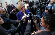 South African opposition Democratic Alliance leader Helen Zille (C) speaks to the media before casting her vote in Rondebosch, Cape Town, May 7, 2014. PHOTO BY REUTERS/Sumaya Hisham