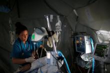 A foreign volunteer works at the emergency field hospital which is run by the US Christian charity Samaritan's Purse, eastern Mosul, Iraq, March 22, 2017. PHOTO BY REUTERS/Suhaib Salem