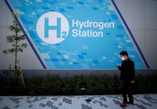 A passerby walks past in front of a hydrogen station in Tokyo, Japan, April 24, 2017. PHOTO BY REUTERS/Issei Kato