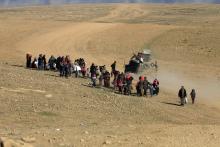 Displaced Iraqis flee their homes as Iraqi forces battle with Islamic State militants, in the district of Maamoun in western Mosul, Iraq, February 25, 2017. PHOTO BY REUTERS/Alaa Al-Marjani