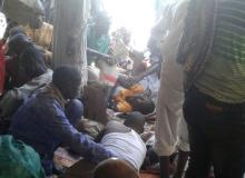 Injured people are comforted at the site after a bombing attack of an internally displaced persons camp in Rann, Nigeria, January 17, 2017. PHOTO BY REUTERS/MSF