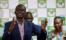 Chief Electoral Officer of Kenya's Independent Electoral and Boundaries Commission (IEBC) Ezra Chiloba, flanked by chairman Wafula Chebukati and commissioner Roselyn Akombe, addresses a news conference at their offices in Nairobi, Kenya, July 6, 2017. PHOTO BY REUTERS/Thomas Mukoya