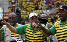 South African President Jacob Zuma addresses supporters of his ruling African National Congress (ANC), at a rally to launch the ANC's local government election manifesto in Port Elizabeth, April 16, 2016. PHOTO BY REUTERS/Mike Hutchings