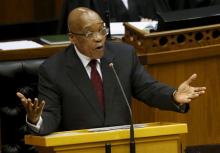 South Africa's President Jacob Zuma answers questions in parliament in Cape Town August 6, 2015. Zuma defended the decision to let Sudanese President Omar Hassan al-Bashir evade an arrest warrant and leave the country in June, saying on Thursday the wanted leader had had immunity as a guest of the African Union. PHOTO BY REUTERS/Mike Hutchings