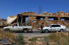 Members from a coalition of rebel groups called "Jaish al Fateh", also known as "Army of Fatah" (Conquest Army), man a checkpoint in Idlib city, Syria, July 18, 2017. PHOTO BY REUTERS/Ammar Abdullah