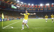 Colombia's James Rodriguez celebrates his goal against Uruguay during their 2014 World Cup round of 16 game at the Maracana stadium in Rio de Janeiro