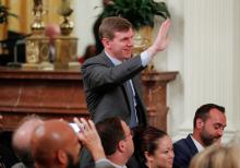 Project Veritas founder and CEO James O'Keefe waves as U.S. President Donald Trump speaks during a "social media summit" meeting with prominent conservative social media figures in the East Room of the White House in Washington, U.S., July 11, 2019. PHOTO BY REUTERS/Carlos Barria