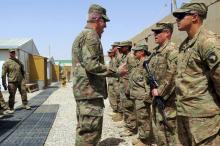 U.S. Army General John Nicholson, commander of Resolute Support forces and U.S. forces in Afghanistan, talks to U.S. soldiers during a transfer of authority ceremony at Shorab camp, in Helmand province, Afghanistan, April 29, 2017. PHOTO BY REUTERS/James Mackenzie
