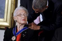 Former U.S. President Barack Obama presents the Presidential Medal of Freedom to NASA mathematician Katherine G. Johnson during an event in the East Room of the White House in Washington November 24, 2015. Johnson is a pioneer in American space history. PHOTO BY REUTERS/Carlos Barria