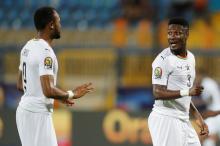 Ghana's Asamoah Gyan and Jordan Ayem. PHOTO BY REUTERS/Amr Abdallah Dalsh