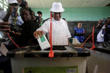 Joseph Nyuma Boakai, Liberia's vice president and presidential candidate of Unity Party (UP), votes at a polling station in Monrovia, Liberia, October 10, 2017. PHOTO BY REUTERS/Thierry Gouegnon