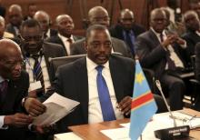 Democratic Republic of Congo's President Joseph Kabila attends a two-day meeting of leaders from the Southern African Development Community (SADC) in Pretoria, November 4, 2013. PHOTO BY REUTERS/Siphiwe Sibeko