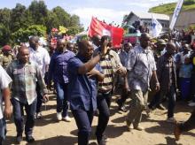 Democratic Republic of Congo's President Joseph Kabila (front C) waves as he walks in a file photo. PHOTO BY REUTERS/Kenny Katombe