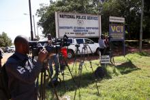 Journalists wait outside the Director of Criminal Investigation headquarters, following the arrest of the head of the National Youth Service Richard Ndubai along with an unspecified number of officials over corruption in Nairobi, Kenya May 28, 2018. PHOTO BY REUTERS/Baz Ratner