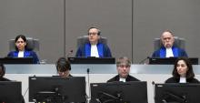 Presiding Judge Marc Perrin de Brichambaut, Judge Olga Herrera-Carbuccia, and Judge Peter Kovacs in the courtroom of the International Criminal Court, as the ICC delivers its order for reparations to victims in the case The Prosecutor v. Germain Katanga at a public hearing, in The Hague, Netherlands March 24, 2017. PHOTO BY REUTERS/Toussaint Kluiters