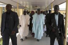 Governor of Borno state Kashim Shettima (C) leaves a hospital that is currently under construction in Maiduguri, May 22, 2014. PHOTO BY REUTERS/Joe Penney