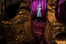 Keegan, 8, who identifies as gender creative, drag name Kween-Kee-Kee, poses for a photograph after completing his first drag performance during the Austin International Drag Festival 2018 near Austin, Texas, U.S., November, 18, 2018. PHOTO BY REUTERS/Amanda Voisard