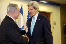Israeli Prime Minister Benjamin Netanyahu (L) meets with U.S. Secretary of State John Kerry as they meet in Jerusalem
