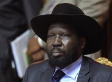 South Sudan's President Salva Kiir sits after he signed a peace agreement with South Sudan's rebel leader Riek Machar in Addis Ababa