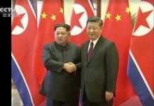 North Korean leader Kim Jong Un shakes hands with Chinese President Xi Jinping, in this still image taken from video released on March 28, 2018. North Korean leader Kim Jong Un visited China from Sunday to Wednesday on an unofficial visit, China's state news agency Xinhua reported on Wednesday. PHOTO BY REUTERS/CCTV