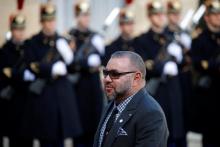 Morocco's King Mohammed VI arrives for a lunch at the Elysee Palace as part of the One Planet Summit in Paris, France, December 12, 2017. PHOTO BY REUTERS/Philippe Wojazer